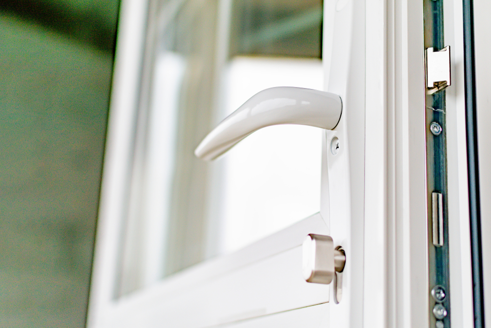 The,Handle,Of,The,New,Plastic,Door.,White,Front,Door